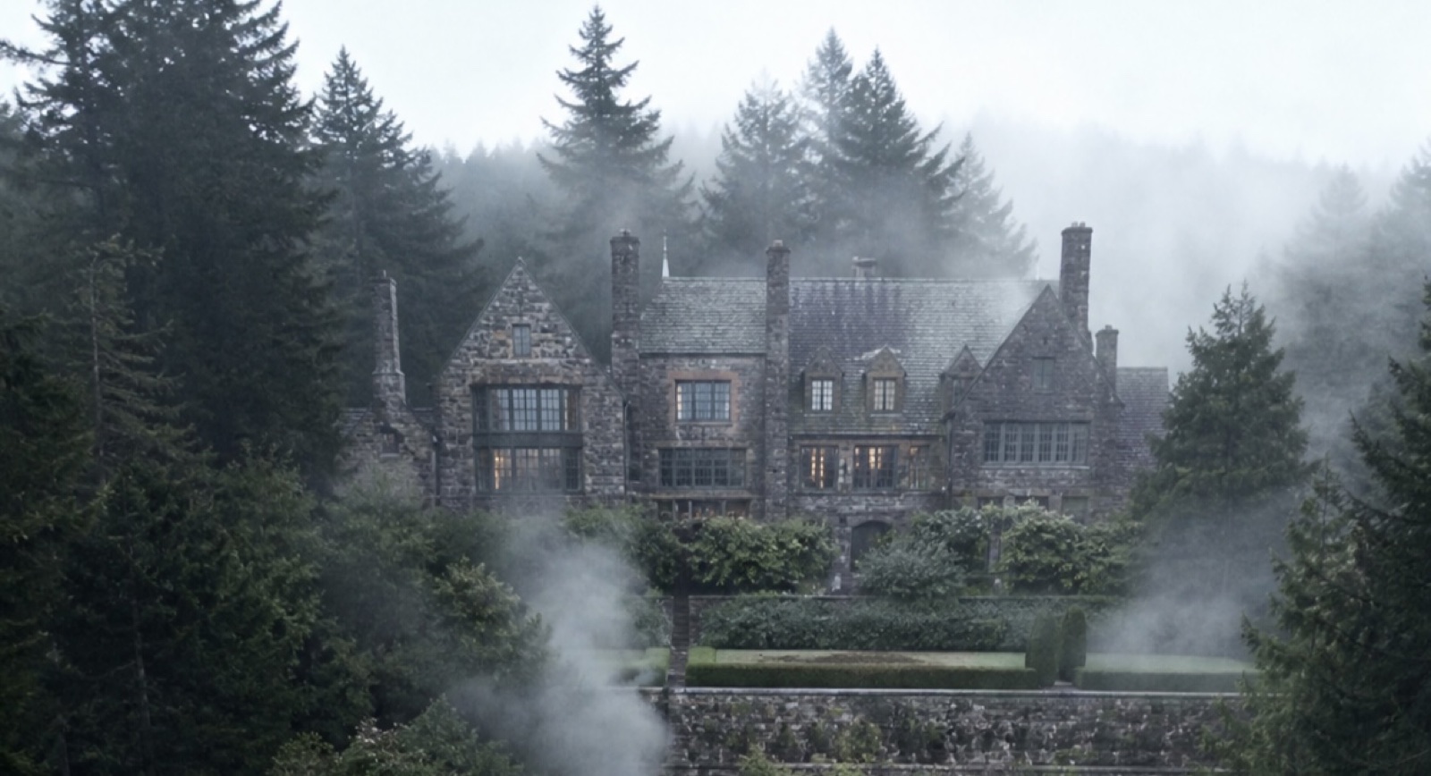 The Appalache manor in fog and Appalachian forest.